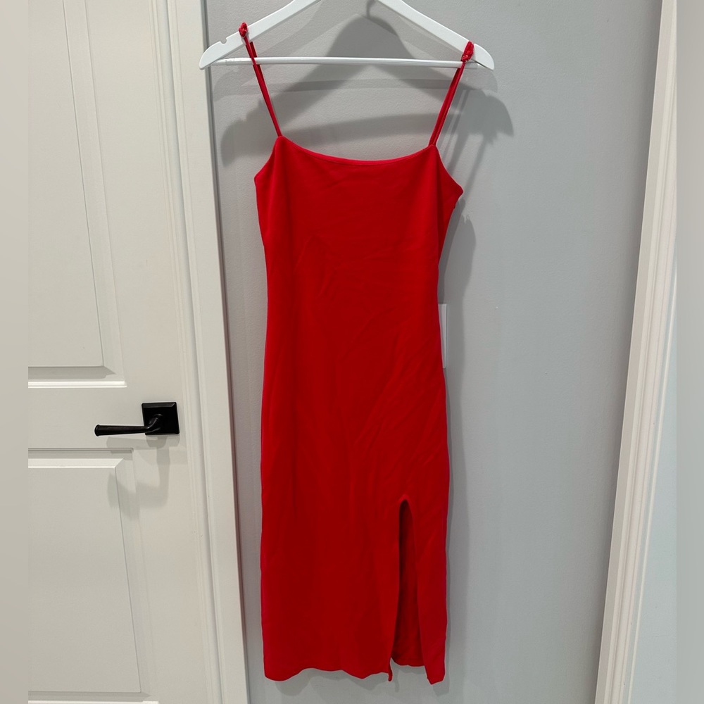 Midi red dress. Stretchy fabric. Very flattering. Adjustable straps.